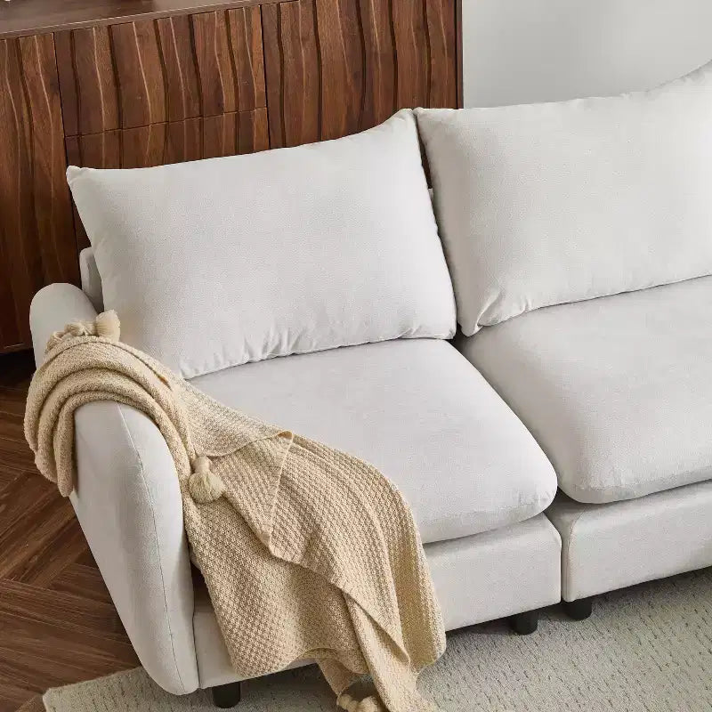 Divano sezionale imbottito Acker Modern 69 con cuscini, bianco